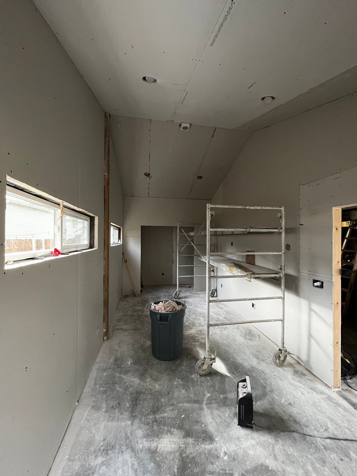 Fresh drywall installed throughout the room