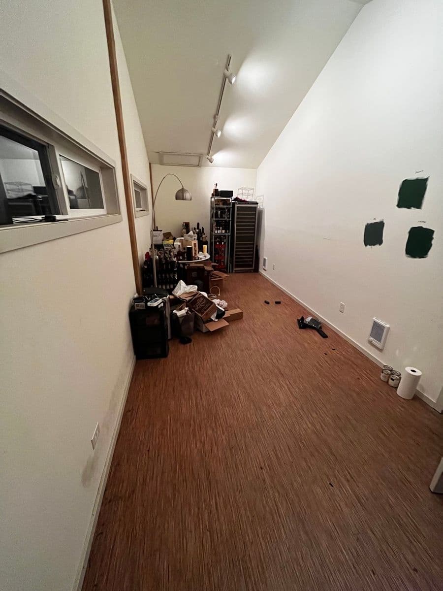 Green paint swatches tested on the ceiling — choosing the right shade